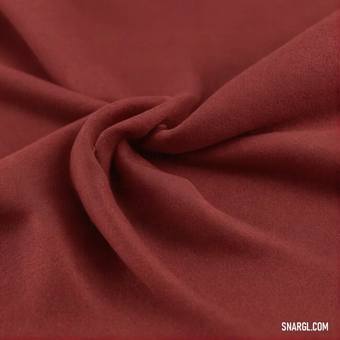 Lush red fabric draped elegantly, accentuated with a rich red border, illustrating the perfect blend of warmth and depth. An exceptional example of the CMYK color composition 0,73,75,43, inviting touch and interaction.