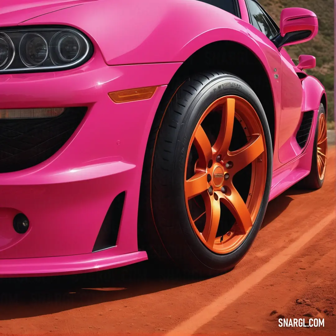 Pink car parked on a dirt road next to a hill side fence and a parking meter with a red light. Color CMYK 0,87,41,15.