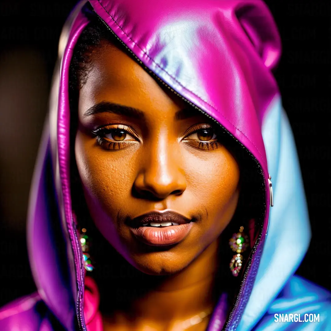 Woman with a pink and blue hoodie on her head and a blue and purple jacket on her head. Color RGB 218,29,129.