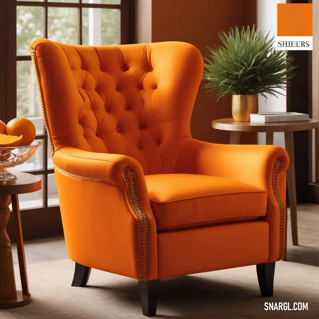 Chair with a buttoned back and a buttoned armrest in an orange room with a potted plant. Example of Yellow Orange color.